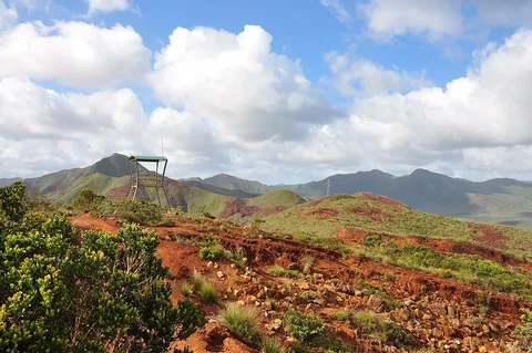 Red earth and hills at Col de Prony